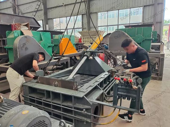 loading of the horizontal scrap metal baler machine 